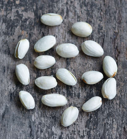 Pistachio on a wooden backgroundの写真素材