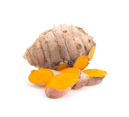 fresh turmeric isolated on white backgroundの写真素材