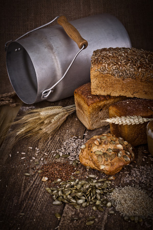 fresh bread and wheat on the wooden - rusticの写真素材
