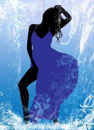 Woman in blue dress on the light background and water sparksの写真素材