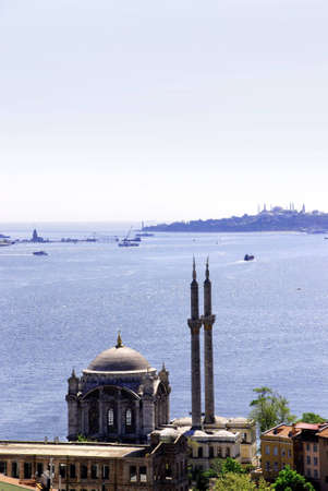 Old turkish mosque on the blue sea backgroundの写真素材