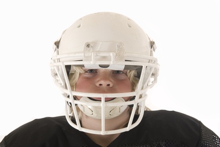 boy American football helmet and shoulder padsの写真素材
