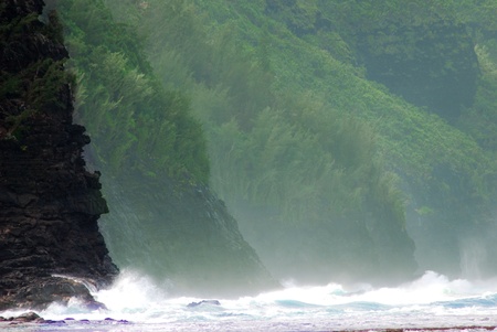 Kauai Hawaii mountainous shoreline crashing wavesの写真素材