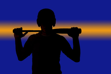 Power stripe silhouette baseball player holding batの写真素材