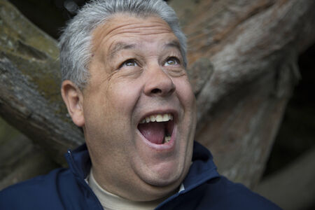 middle aged man excited look mouth open