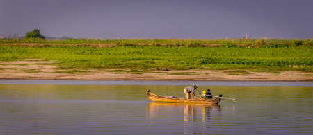 Fisherman on Ayeyarwardy river, Myanmarのeditorial素材
