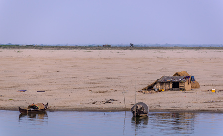House on riverbank in Myanmar, Ayeyarwady riverの写真素材