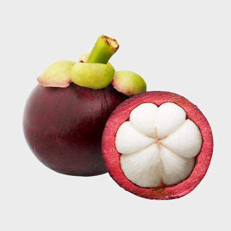 Mangosteen fruit isolated on white background with clipping path.の写真素材