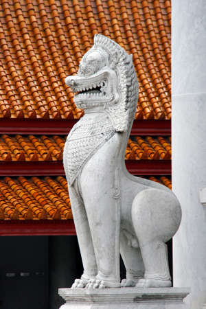 Traditional stone dragon statues. Grand Palace, Bangkok. Thailand.の写真素材