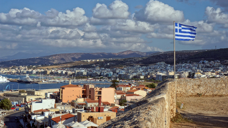 View of the Greek island of Crete. Greek flag.の写真素材