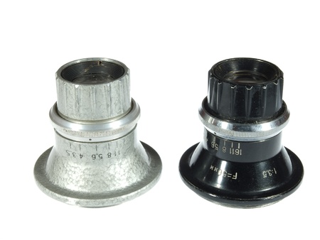 Two old vintage lens isolated on white background        の写真素材