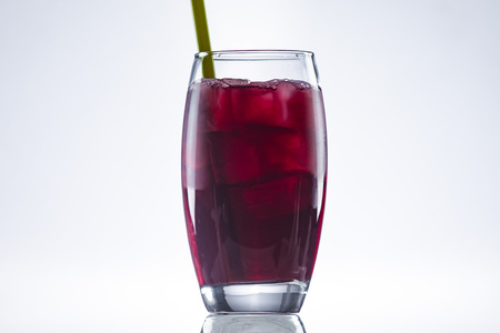 An image of a cocktail with ice cubesの写真素材