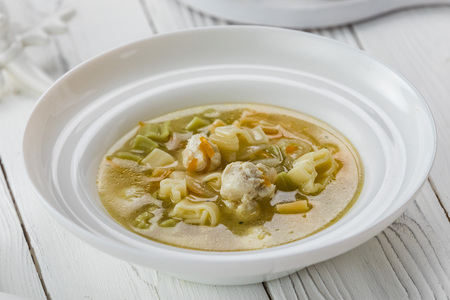 A tasty soup with meat in a bowlの写真素材