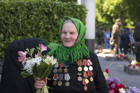 KIEV, UKRAINE - MAY 9, 2016: People celebrate Day of the Victory in the Second World War in the Park of Glory, Kievのeditorial素材