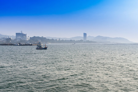 Oil station seascape - sunsetの写真素材