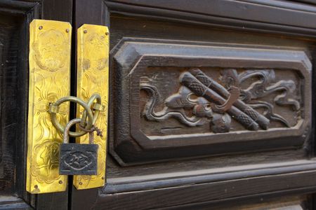 Wood carving patterns and lockの写真素材