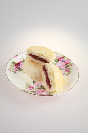 Mid-Autumn Festival moon cake in saucerの写真素材