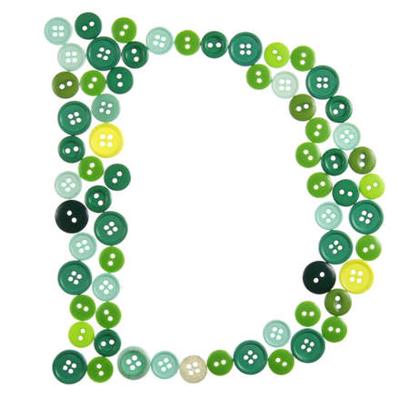 The letter D made of photographed buttons, isolated on a white backgroundの写真素材