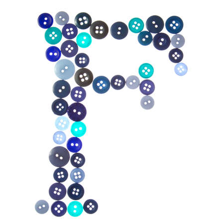 The letter F made of photographed buttons, isolated on a white backgroundの写真素材