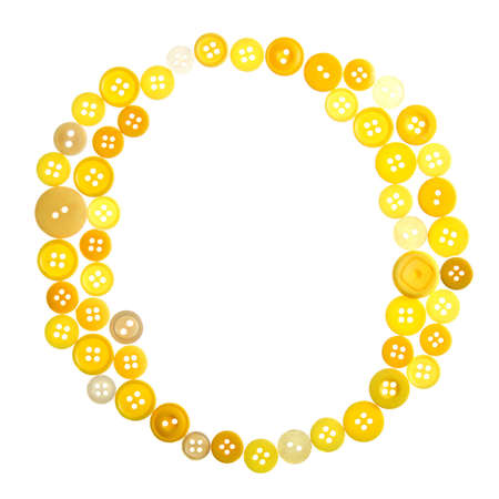 The letter O made of photographed buttons, isolated on a white backgroundの写真素材