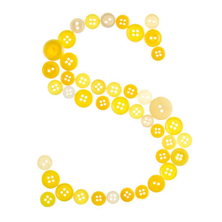 The letter S made of photographed buttons, isolated on a white backgroundの写真素材