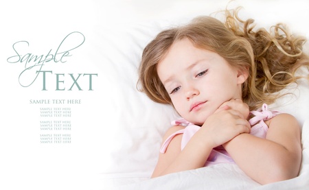 Sick or sad girl preschooler age in bed at home Sick or sad girl preschooler age in bed at home