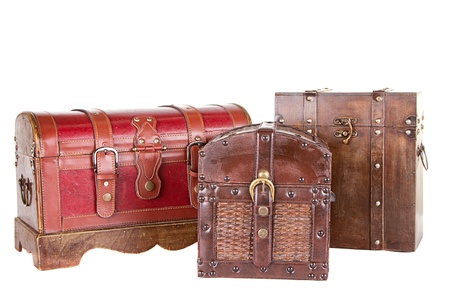Group of three antique chests or trunks isolated on whiteの写真素材