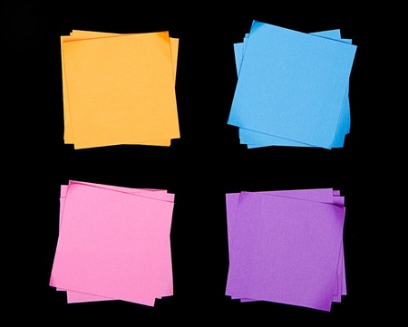 multi colored sticky notes on a black backgroundの写真素材