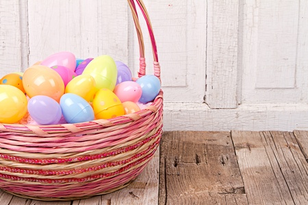 Plastic Easter Eggs In Easter Basket On Rustic Wooden Background Royalty Free Images Photos And Pictures