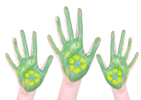 Green painted hands with the words reduce, reuse, and recycle on them, isolated on a white backgroundの写真素材
