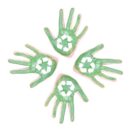 Green painted hands with the recycle symbol on them, isolated on white backgroundの写真素材