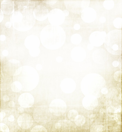 Christmas or winter abstract background with golden tones amd a grunge metallic overlay.の写真素材