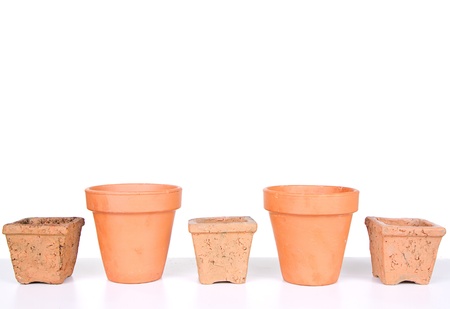 Terracotta or clay gardening pots on a white backgroundの写真素材