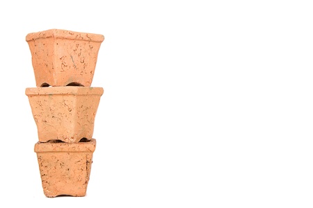 Terracotta or clay gardening pots on a white backgroundの写真素材