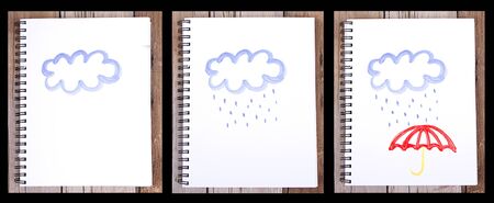Series of paintings of sketches on notebook of clouds with rain and umbrella, on wooden plank for backgroundの写真素材