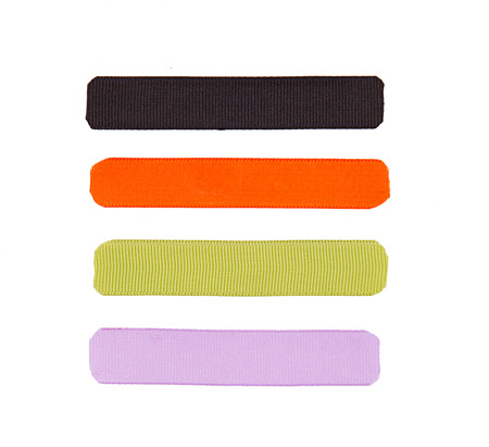 Halloween colored ribbon tags with buttons isolated on whiteの写真素材