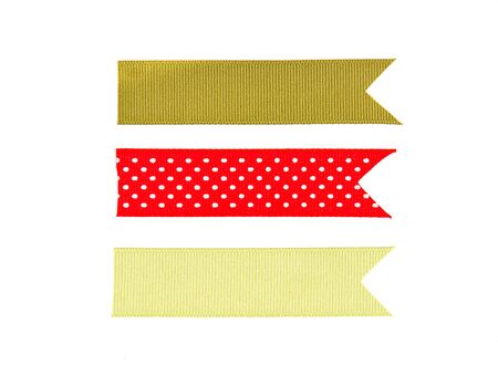 Christmas ribbon tags isolated on a white backgroundの写真素材
