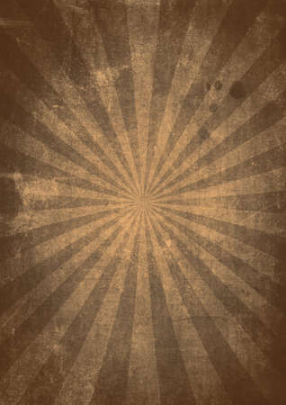 A brown/sepia sunburst effect grunge textured background with aged paper effectの写真素材
