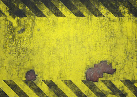 A distressed, corroded and rusty black and yellow metal effect hazard warning sign with blank copy space in the center for designの写真素材