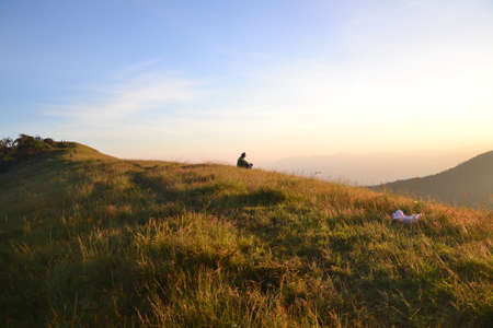 silhouette of a person in a fieldの写真素材