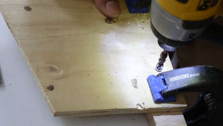 carpenter cutting woodの写真素材