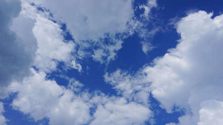 Sky with white clouds with natural sunlight is beautiful for backgrounds, backdrops, illustrations,...