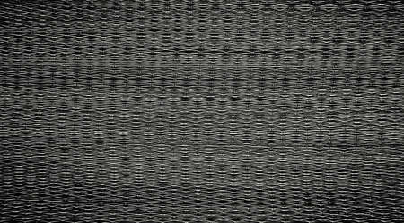 Black mesh texture for backgrounds or other design illustrations and artwork.