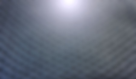 Blurred gray gradient texture with light for background or illustration.