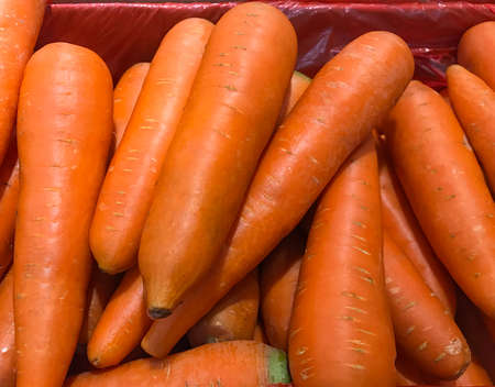 Fresh orange carrots, high vitamin foods for a healthy vegetarian menu.