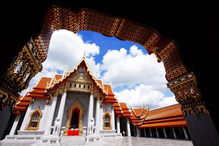Marble Temple Under A Blue Sky in Bangkok, Thailandの写真素材