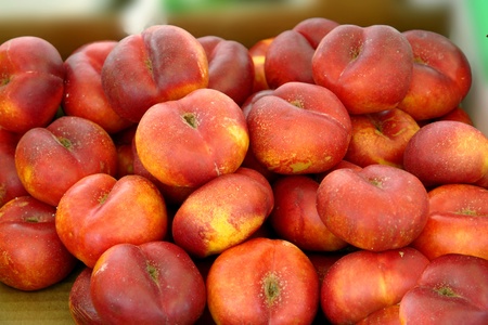  plenty of flat peaches a fig                              の写真素材