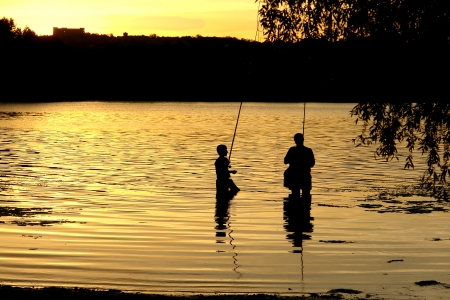 Father and son on fishing                               の写真素材