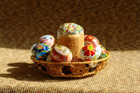 Easter cake with eggs in a basket                             の写真素材