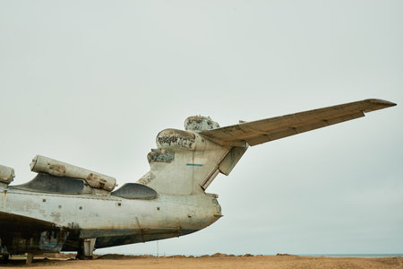 Abandoned Soviet Lun-class ekranoplan on the coast of the Caspian Sea, aerial view.
